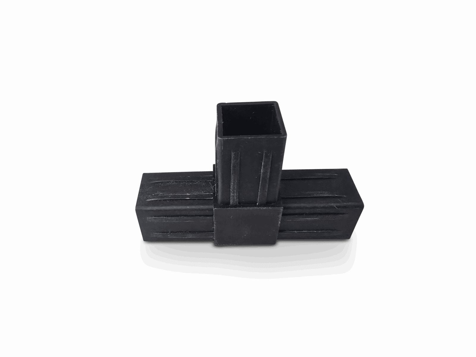 Three-way black plastic connector with rectangular openings for square tubing.