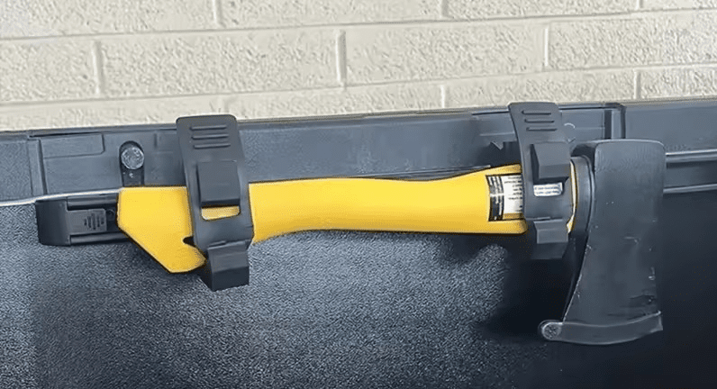 Rubber Grip Clamps Securing Axe
